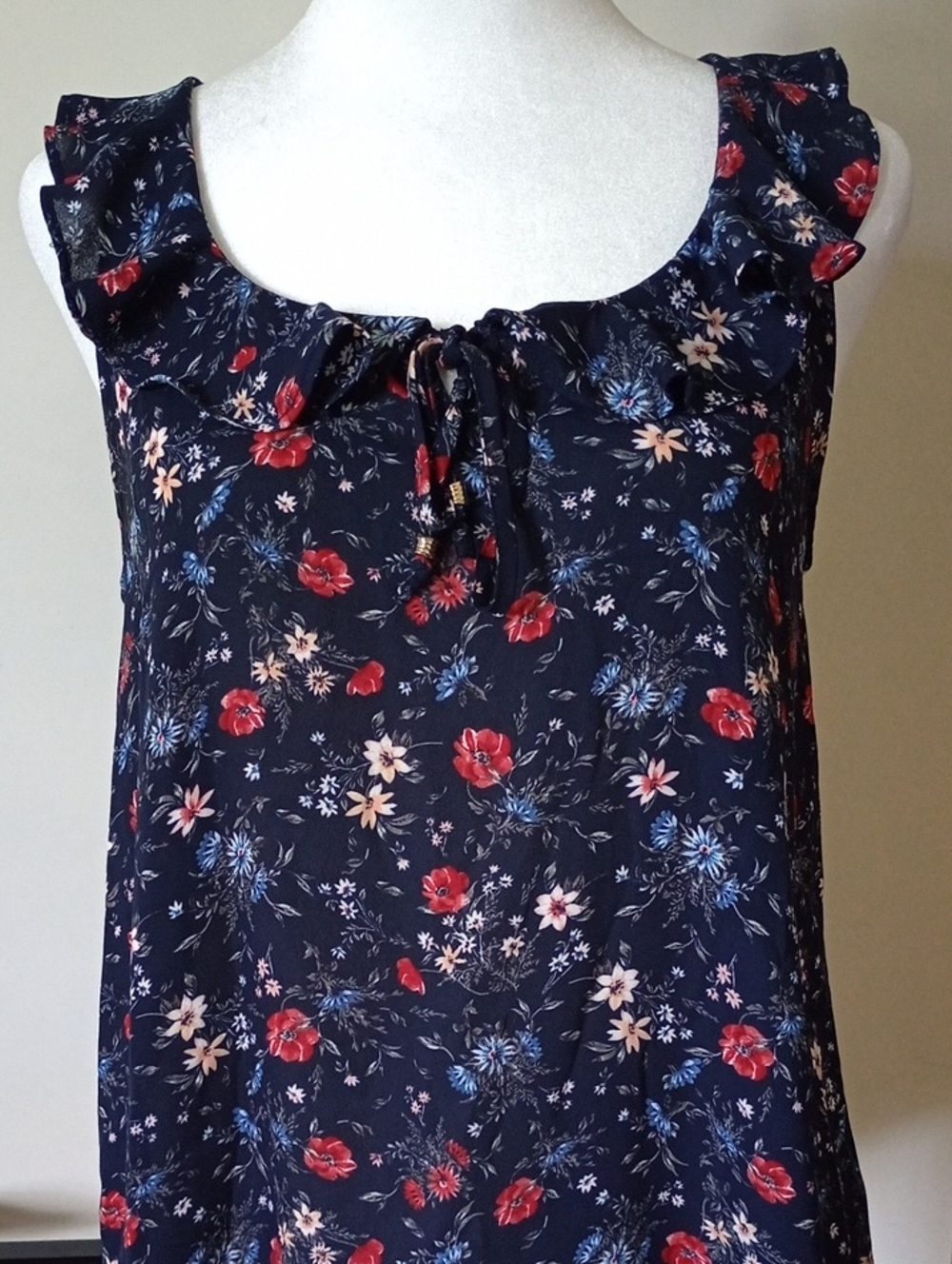 Navy Floral Sleeveless Top With Flutter Sleeves Size Small